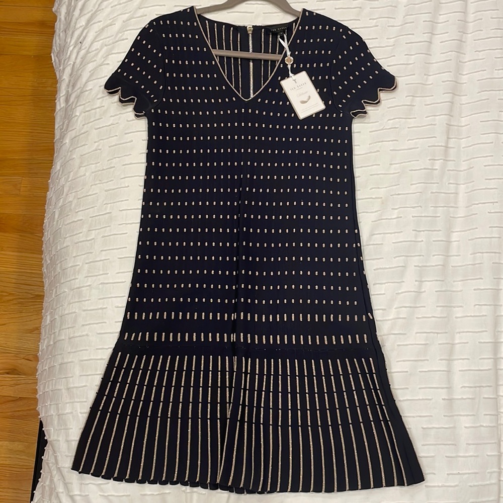 Gorgeous size 1 Ted Baker navy knit dress with gold knit detail.